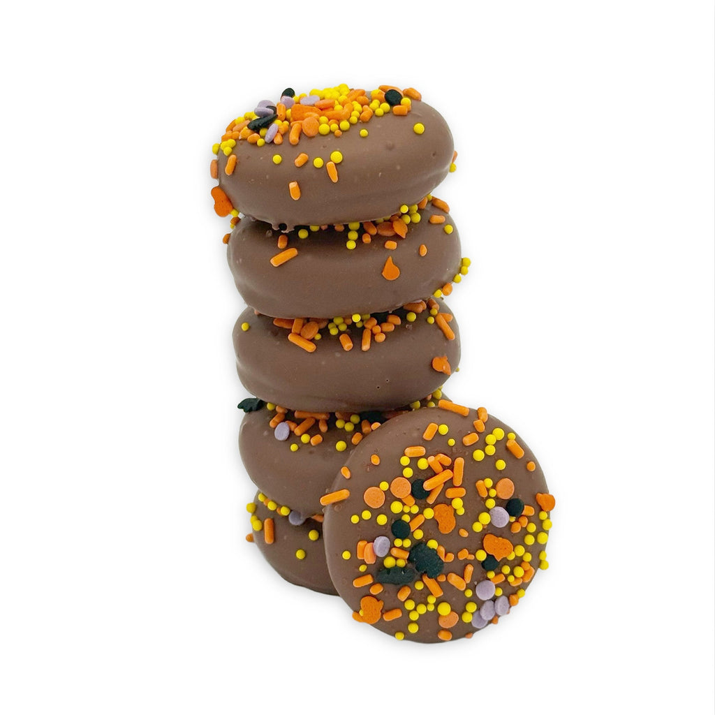 Stack of Halloween sprinkled milk chocolate Oreos